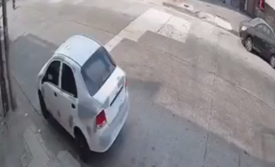 Dos delincuentes en moto.
